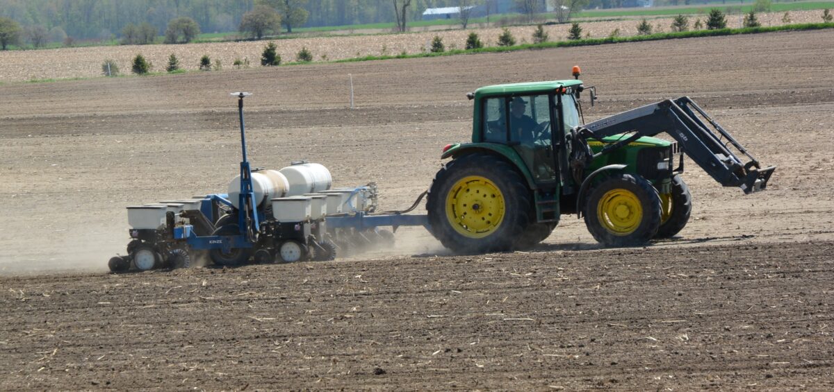 Planter going through a field for seeding